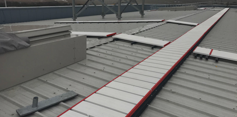 WalkAngel uPVC safe access routes installed across a flat commercial roof